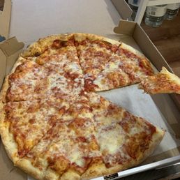 Plain pizza pie. Buy ten, get one free (pick-up only) lol