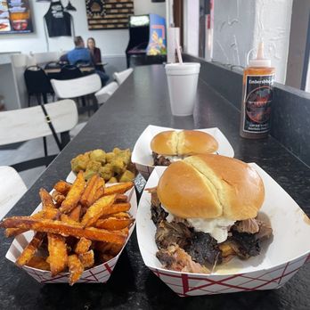 Embers BBQ - two sandwiches and fries on a table - Barbeque Near Me - Southern Pines, North Carolina