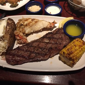 Red Lobster - Rock lobster (little undercooked) Center cut steak (perfect!)  Baked potato (pretty good)  Corn cob (super)  Meal was really good! - Seafood Near Me - Bakersfield, California