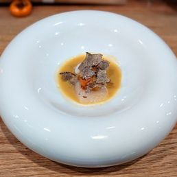 a plate of food on a wooden table a plate of food on a wooden table