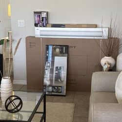 Best Buy Liquors - 65 " TV & Sound Bar