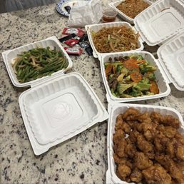 Family value meal: Orange chicken, beef broccoli, garlic string beans, lo-mein, fried rice & veggie egg rolls Family value meal: Orange chicken, beef broccoli, garlic string beans, lo-mein, fried rice & veggie egg rolls