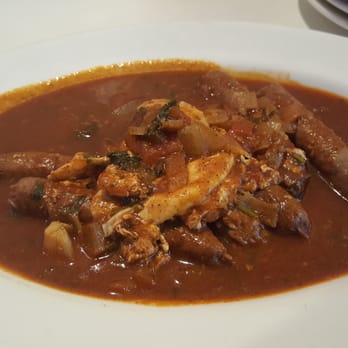 Fettoosh - Murguez Tagine (beef and lamb sausage in a spicy tomato sauce) - Moroccan Near Me - Arlington, Virginia Fettoosh - Murguez Tagine (beef and lamb sausage in a spicy tomato sauce) - Moroccan Near Me - Arlington, Virginia