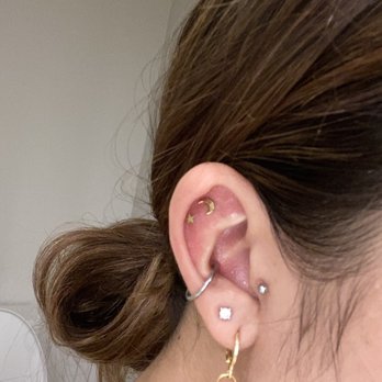 Honolulu Piercing Company - Flat jewelry change to star and moon - Piercing Near Me - Honolulu, Hawaii