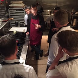 Clay teaching the UL Global Team how to prepare perfect steaks