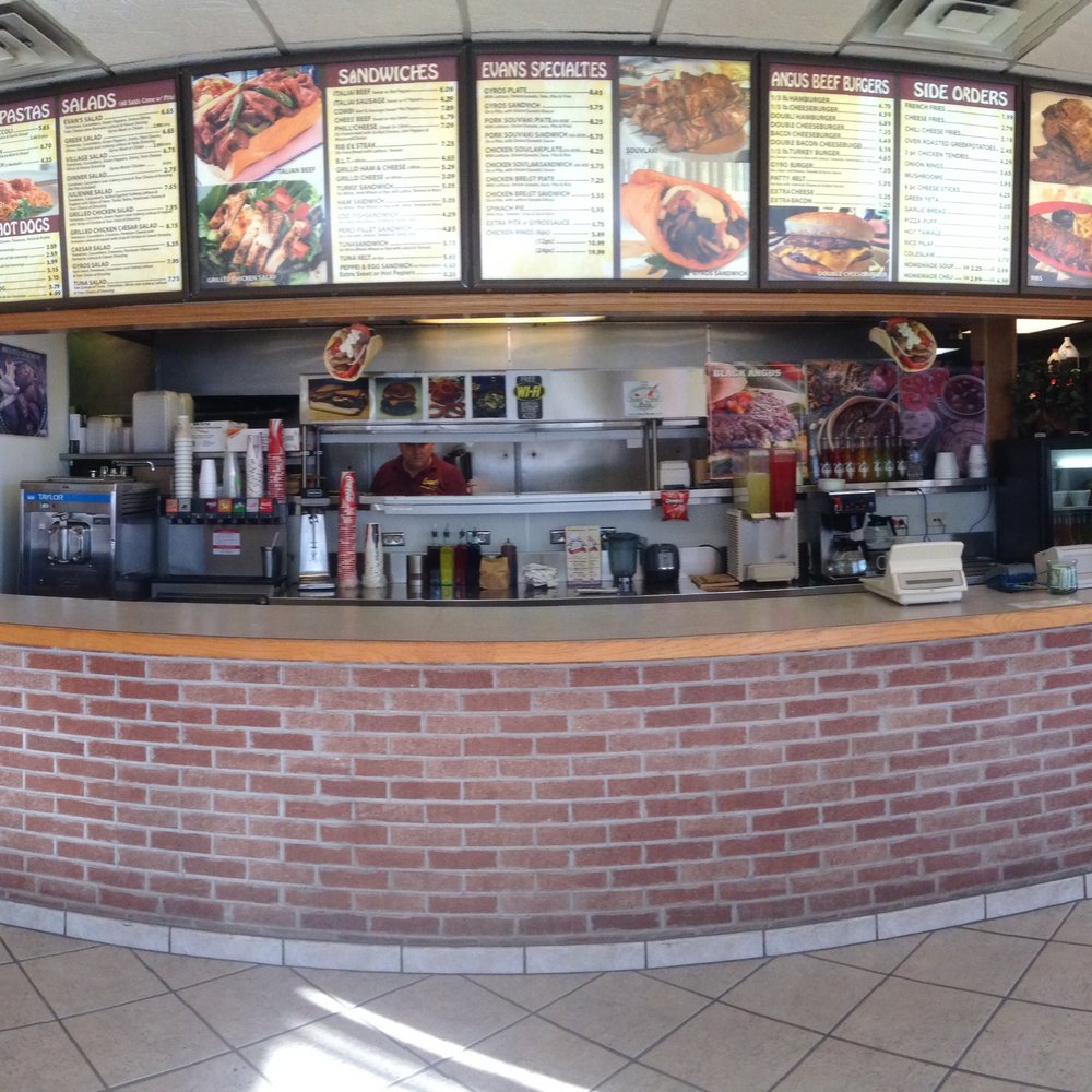 Evan's Place - Their menu is huge! So much to choose from I couldn't make up my mind. The nice cashier recommended the chicken souvlaki plate. - Fast Food Near Me - Des Plaines, Illinois Evan's Place - Their menu is huge! So much to choose from I couldn't make up my mind. The nice cashier recommended the chicken souvlaki plate. - Fast Food Near Me - Des Plaines, Illinois