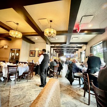 Trattoria 35 - a restaurant with people sitting at tables - Pizza Near Me - Bayside, New York Trattoria 35 - a restaurant with people sitting at tables - Pizza Near Me - Bayside, New York
