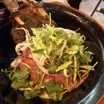Remton - Smoked beef rib pho. Before she poured piping hot broth over the top from a kettle. - Vietnamese Near Me - Pearland, Texas Remton - Smoked beef rib pho. Before she poured piping hot broth over the top from a kettle. - Vietnamese Near Me - Pearland, Texas