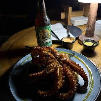 Hemingway - Grilled Octopus and Indio cerveza! - Lounges Near Me - San Miguel de Cozumel, ROO Hemingway - Grilled Octopus and Indio cerveza! - Lounges Near Me - San Miguel de Cozumel, ROO
