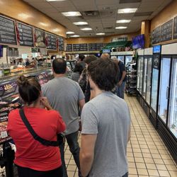 Taliercio's Ultimate Gourmet - The line was put the door.