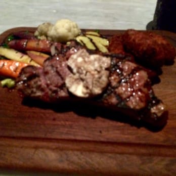 Union Public House - NY Strip with amazing roasted vegetables. The fried potato things were not enjoyed. Served on a cutting board. - American Near Me - Tucson, Arizona Union Public House - NY Strip with amazing roasted vegetables. The fried potato things were not enjoyed. Served on a cutting board. - American Near Me - Tucson, Arizona