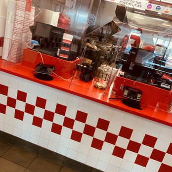 Five Guys - the counter of a fast food restaurant - Burgers Near Me - Parkville, Maryland