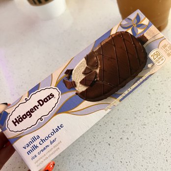 Delta Sky Club - a hand holding a chocolate ice cream sandwich - Airport Lounges Near Me - West Palm Beach, Florida Delta Sky Club - a hand holding a chocolate ice cream sandwich - Airport Lounges Near Me - West Palm Beach, Florida