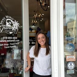 Small World Travel & Tours - Photo of the very friendly and knowledgeable staff