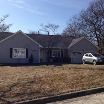 JA Roofing - Raised the roof up 4 feet.  Installed a Pewter Gray roof and resided the house. - Roofing Near Me