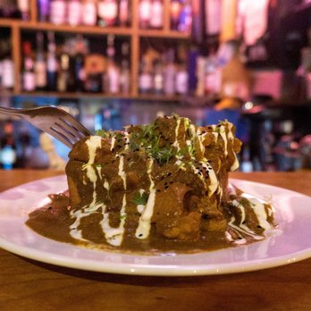 Nue - South African Bunny Chow - Tapas/Small Plates Near Me - Seattle, Washington Nue - South African Bunny Chow - Tapas/Small Plates Near Me - Seattle, Washington