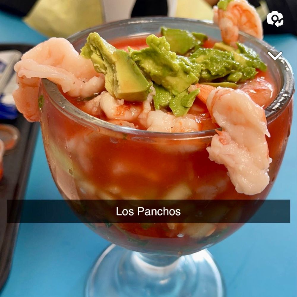 Los Panchos Taco Shop - a woman sitting at a table - Mexican Near Me - Oceanside, California Los Panchos Taco Shop - a woman sitting at a table - Mexican Near Me - Oceanside, California