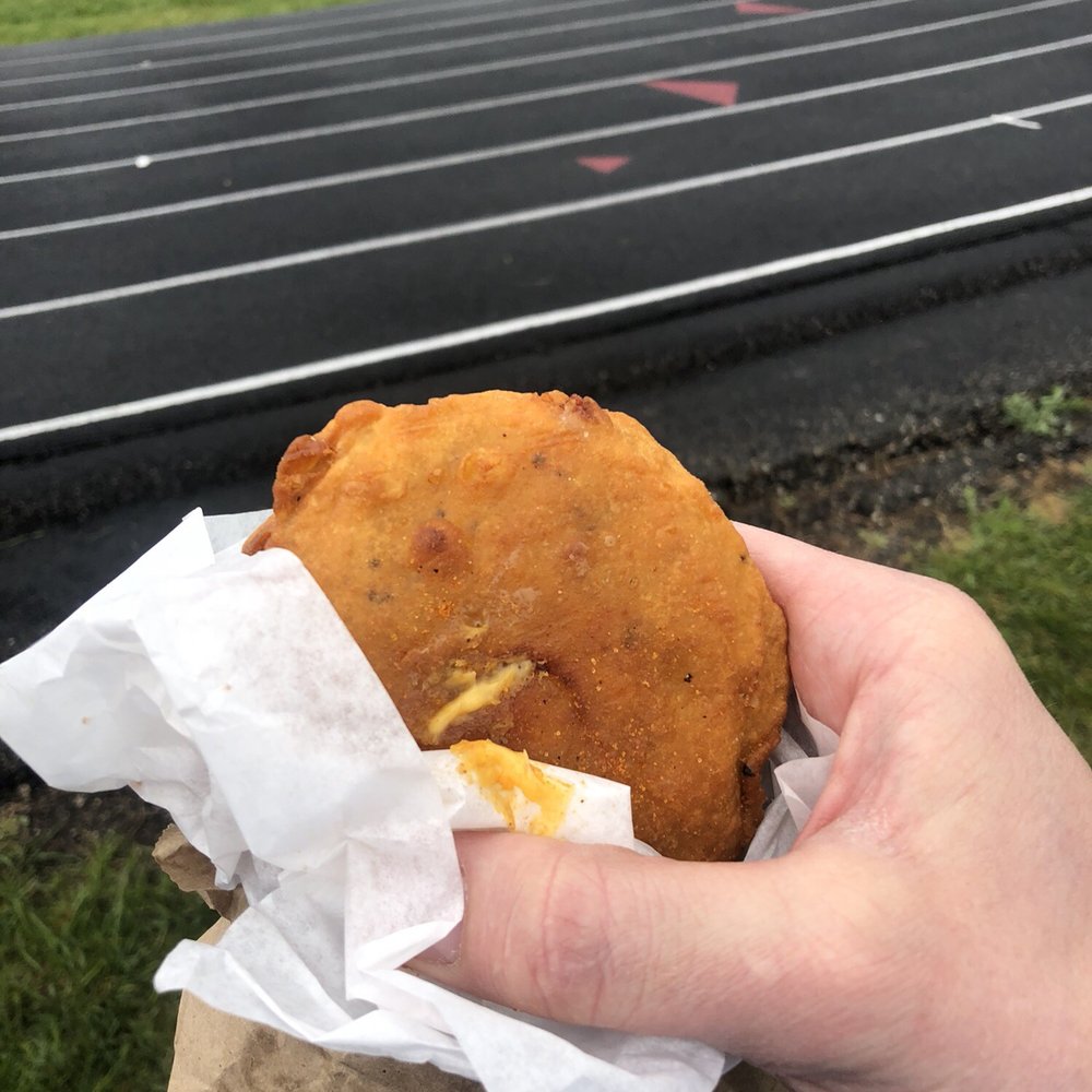The surprisingly tasty cheese wheel, which is nothing more than a hamburger patty with cheese, breaded and deep-fried. The surprisingly tasty cheese wheel, which is nothing more than a hamburger patty with cheese, breaded and deep-fried.