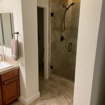 Stranahan Tile - a bathroom with a walk in shower - Tiling Near Me Stranahan Tile - a bathroom with a walk in shower - Tiling Near Me