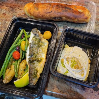 Barbounia - Restaurant Week Winter 2021 - Baked Mediterranean branzino with fingerling potatoes, haricot vert, and hummus - Greek Near Me - New York, New York Barbounia - Restaurant Week Winter 2021 - Baked Mediterranean branzino with fingerling potatoes, haricot vert, and hummus - Greek Near Me - New York, New York