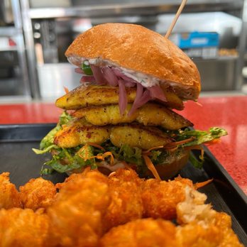 This Mama’s House - Pan seared turmeric fish sandwich - Caterers Near Me This Mama’s House - Pan seared turmeric fish sandwich - Caterers Near Me