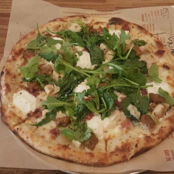 Blaze Pizza - White top pizza with sausage, chicken, spinach, ricotta, and feta - Pizza Near Me - Sugar Land, Texas Blaze Pizza - White top pizza with sausage, chicken, spinach, ricotta, and feta - Pizza Near Me - Sugar Land, Texas