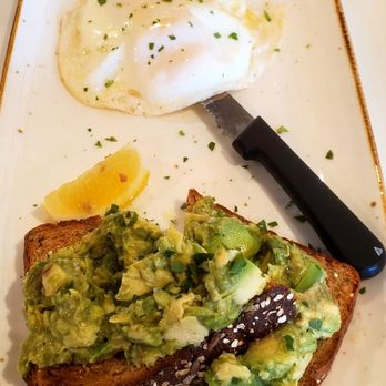 First Watch - Avocado Toast (thick-cut whole grain artisan toast, fresh smashed avocado, EVOO, lemon and Maldon sea salt with two basted cage-free eggs). - Breakfast & Brunch Near Me - Paramus, New Jersey