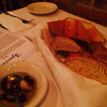 Cafe Picasso - Complimentary bread basket with olive oil and roasted garlic. - Italian Near Me - Somerville, New Jersey