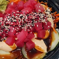 Tap & Grill Lake side Brew Haus - New Edition tuna poke Bowl outside by the pool