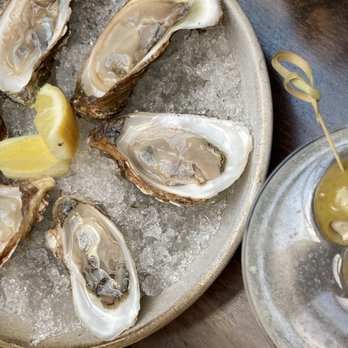 Spoon and Stable - Prince Edward Island Oysters - briny and fresh!  Blue Cheese Olive dressed vodka martini - cold and dry! - New American Near Me - Minneapolis, Minnesota