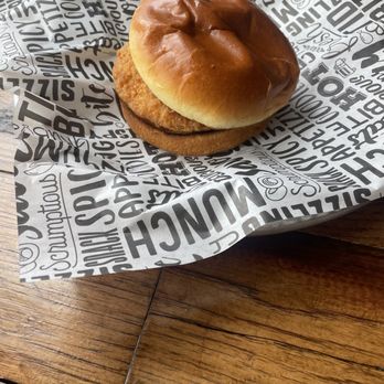 Manzo's Burger - a sandwich on a wrapper - Burgers Near Me - Chicago, Illinois
