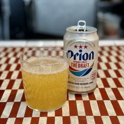 Little Grenjai - Yuzu Sake Splash - Orion beer topped with Kaju 39 yuzu sake