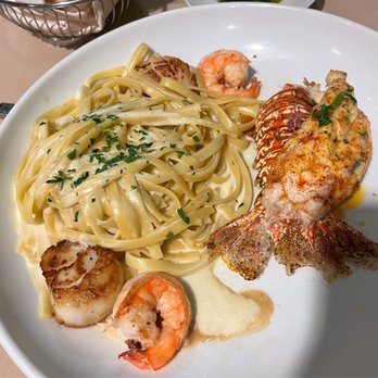 Andiamo - Seafood trio w homemade linguine - Italian Near Me - Detroit, Michigan Andiamo - Seafood trio w homemade linguine - Italian Near Me - Detroit, Michigan