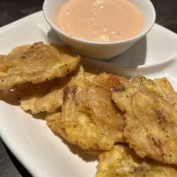 Plantains, perfectly seasoned with dipping sauce