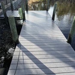 Sunkissed Home Services - Boat dock after being cleaned and sealed