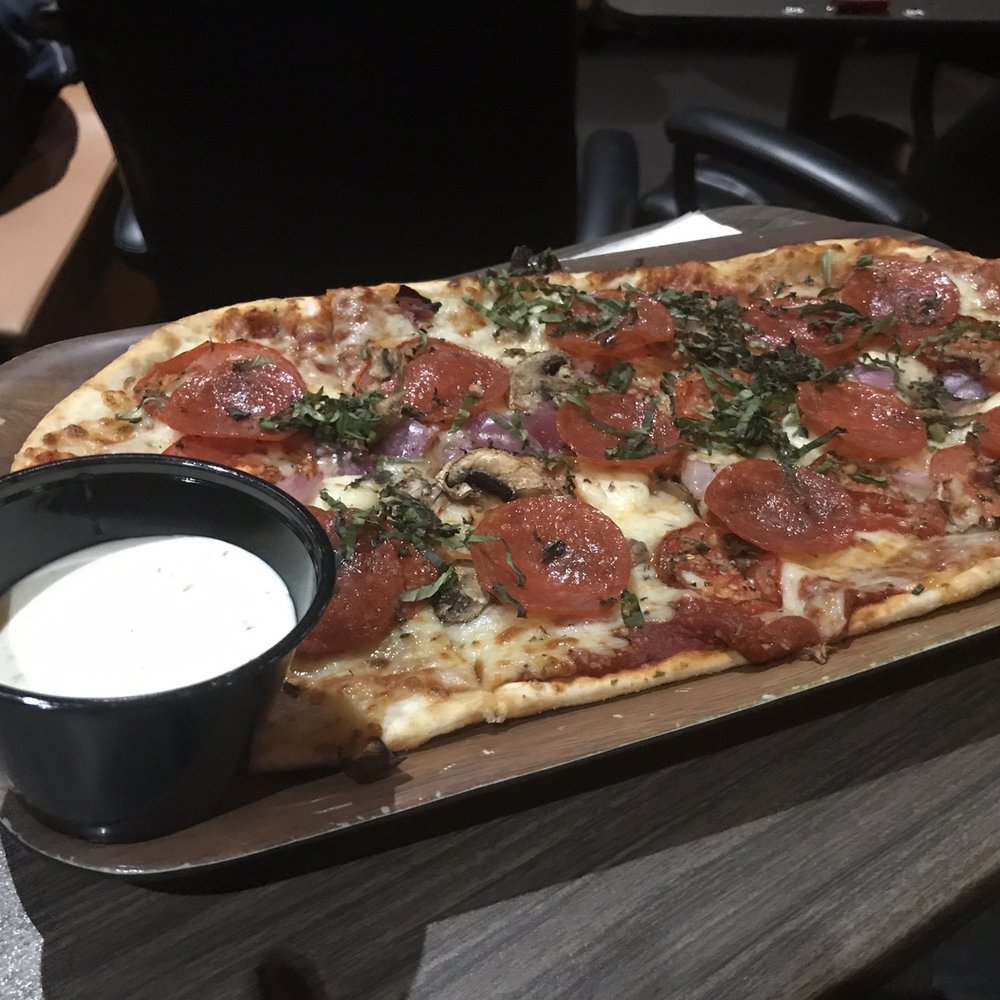 Studio Movie Grill - Flat bread pizza with pepperoni and mushrooms - American Near Me - The Colony, Texas Studio Movie Grill - Flat bread pizza with pepperoni and mushrooms - American Near Me - The Colony, Texas