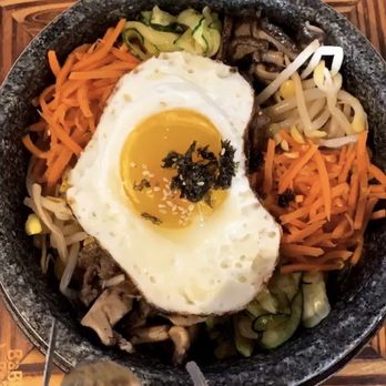 BaBbi BaBbi Korean Kitchen - (Please excuse the baby. It was a gif added from instagram lol) Bibimbap bowl. - Korean Near Me - Orlando, Florida