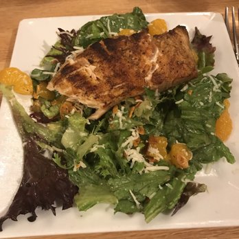 Malo - Malo salad with salmon! This was the small salad and still so much food. - Latin American Near Me - Des Moines, Iowa