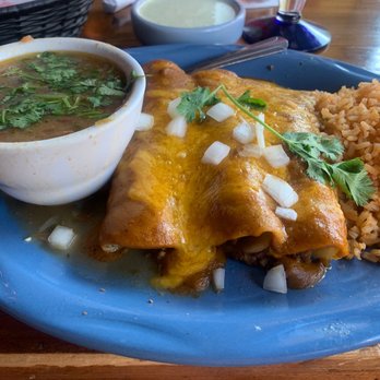 Taquilo's - Ground beef enchiladas w/chopped onions, charros and rice - Mexican Near Me - Galveston, Texas Taquilo's - Ground beef enchiladas w/chopped onions, charros and rice - Mexican Near Me - Galveston, Texas