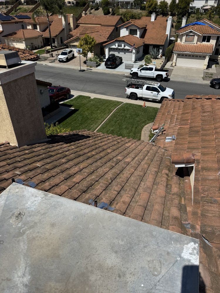 Slide of V J Roofing