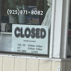 The Creative Seamstress - CLOSED sign always up.