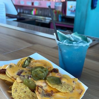 Pelican & The Shark - Nachos from downstairs & shark attack margarita - Cocktail Bars Near Me - Galveston, Texas