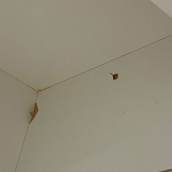 Great Woods Cabinetry - Incorrect brad nails damaging finish on inside of cabinet - Cabinetry Near Me - Anoka, Minnesota