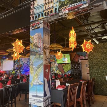 Tasca De España - Colorful place with Indian lanterns and columns with collage art - Spanish Near Me - Miami, Florida Tasca De España - Colorful place with Indian lanterns and columns with collage art - Spanish Near Me - Miami, Florida