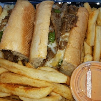 L'auberge Philly Cheese Steak - LambProvoloneCheeseSteak with everything (cheese whiz, grilled onions & grilled peppers) , fries and frysauce. So good! - Cheesesteaks Near Me - Beaverton, Oregon
