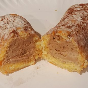 Eet Gud Bakery - Long John (section view of the Chocolate cream filled). - Bakeries Near Me - Trenton, New Jersey Eet Gud Bakery - Long John (section view of the Chocolate cream filled). - Bakeries Near Me - Trenton, New Jersey