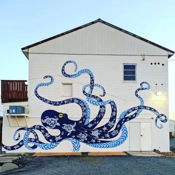 Fisherman's Grille - an octopus painted on the side of a building - Seafood Near Me - Crisfield, Maryland Fisherman's Grille - an octopus painted on the side of a building - Seafood Near Me - Crisfield, Maryland
