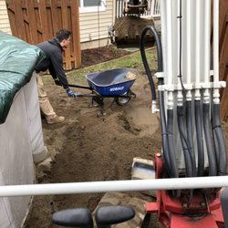 Meade Landscaping - Prepping for Retaining wall and paver patio.