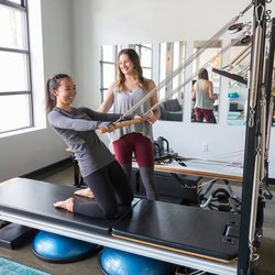 Emerald City Pilates - Tight hip flexors will be a thing of the past with the Thigh Stretch exercise on the Cadillac.