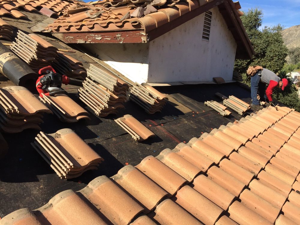 Slide of Al's roofing repairs